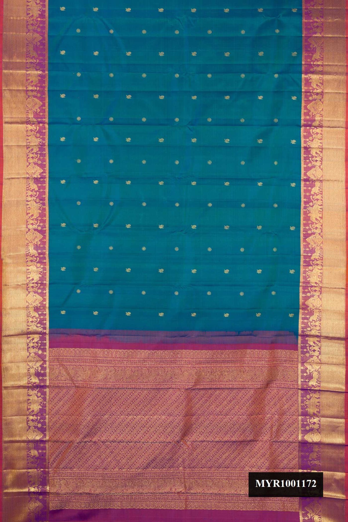 Peacock Blue Dual Tone Kanchipuram Silk Saree with Zari Butta on the body and Zari Border.  displayed on a mannequin