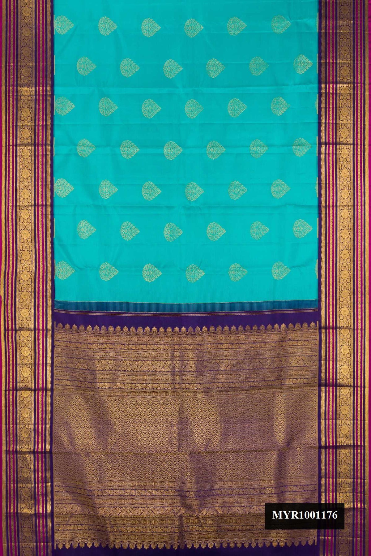 Peacock Blue Dual Tone Kanchipuram Silk Saree with Zari Butta on the body and Fancy Border.  displayed on a mannequin