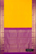 Yellow Dual Tone Kanchipuram Silk Saree with Zari Butta on the body and Fancy Border.  displayed on a mannequin