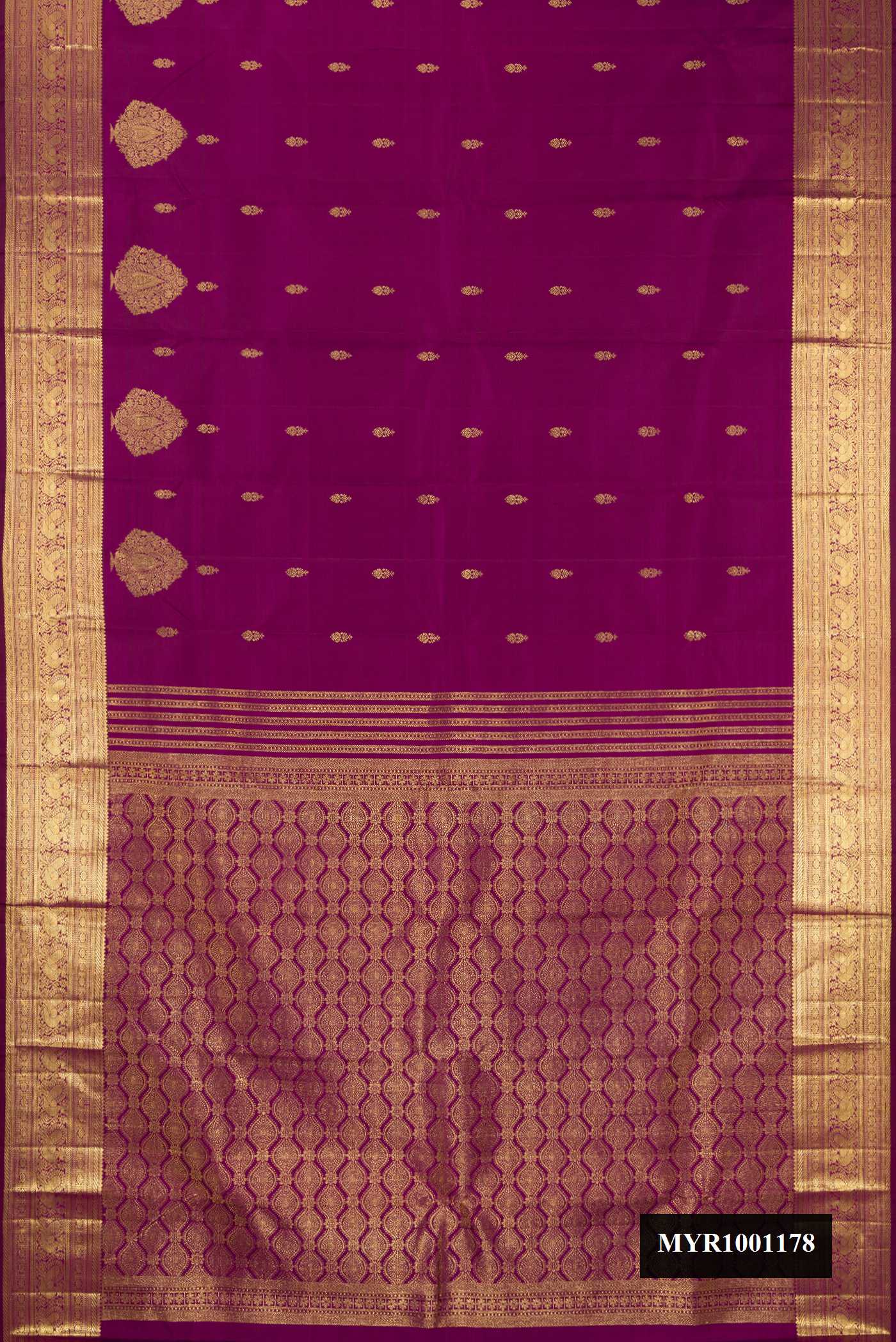 Purple Dual Tone Kanchipuram Silk Saree with Zari Butta on the body and Fancy Border.  displayed on a mannequin