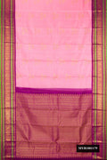 Rose pink Dual Tone Kanchipuram Silk Saree with Zari Butta on the body and Fancy Border.  displayed on a mannequin