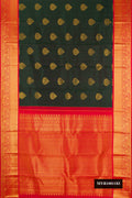 Bottle Green Dual Tone Kanchipuram Silk Saree with Zari Butta on the body and Zari Border.  displayed on a mannequin