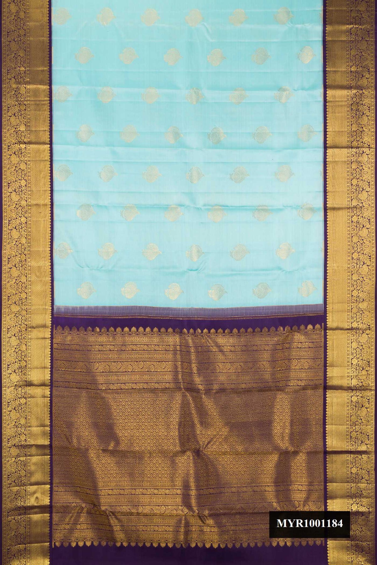 Sky Blue Dual Tone Kanchipuram Silk Saree with Zari Butta on the body and Zari Border.  displayed on a mannequin