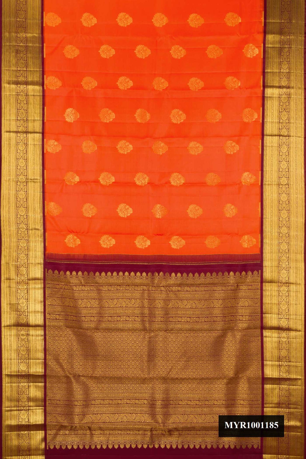 Orange Dual Tone Kanchipuram Silk Saree with Zari Butta on the body and Zari Border.  displayed on a mannequin