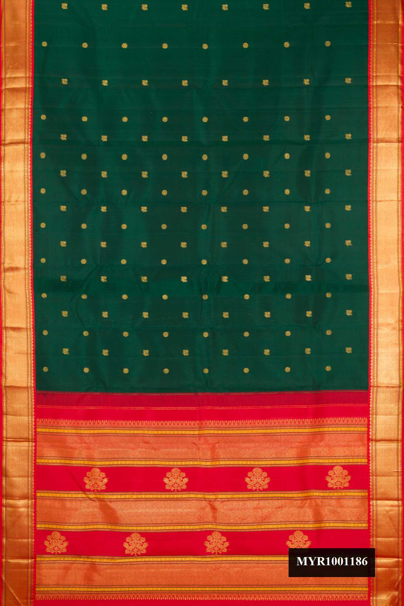 Bottle Green Dual Tone Kanchipuram Silk Saree with Zari Butta on the body and Zari Border.  displayed on a mannequin