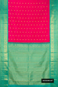 Rani Pink Dual Tone Kanchipuram Silk Saree with Zari Butta on the body and Zari Border.  displayed on a mannequin