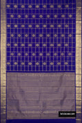 Royal Blue Dual Tone Kanchipuram Silk Saree with Checked design on the body and Zari Border.  displayed on a mannequin