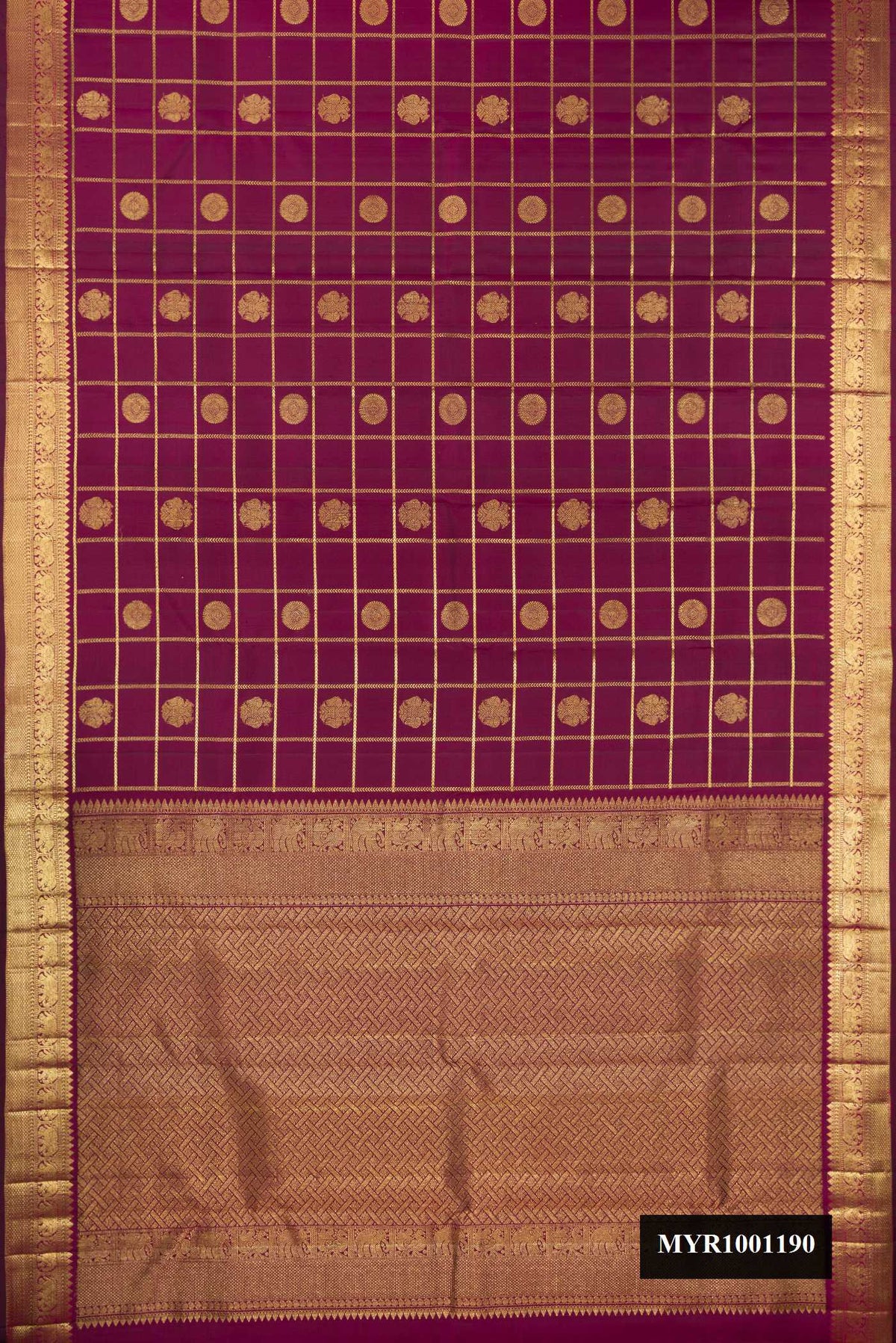 Magenta Dual Tone Kanchipuram Silk Saree with Checked design on the body and Zari Border.  displayed on a mannequin