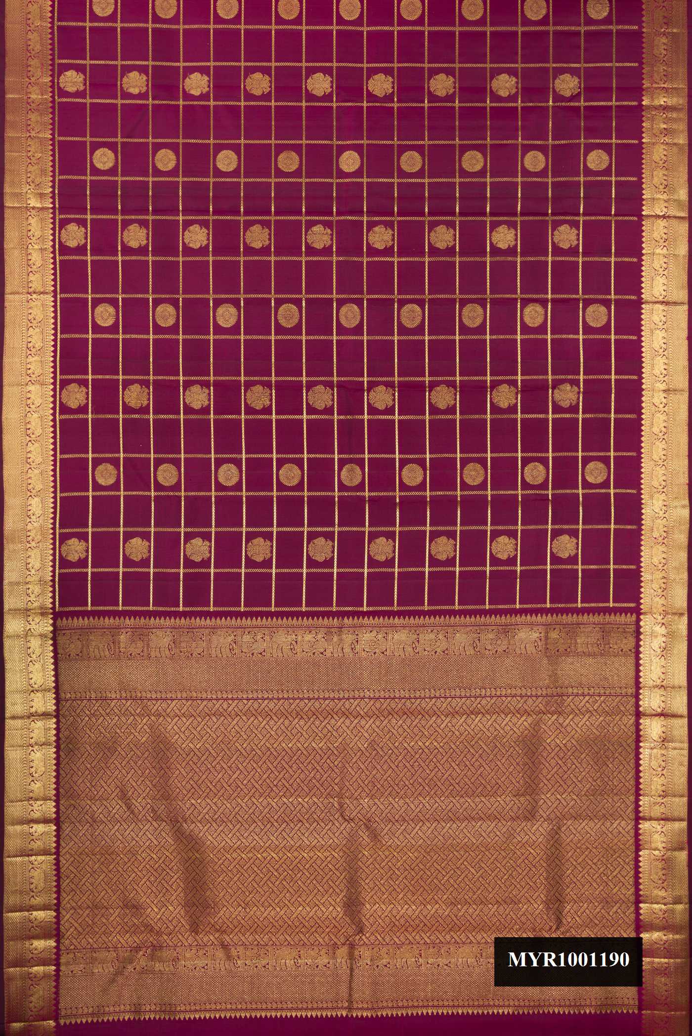 Magenta Dual Tone Kanchipuram Silk Saree with Checked design on the body and Zari Border.  displayed on a mannequin