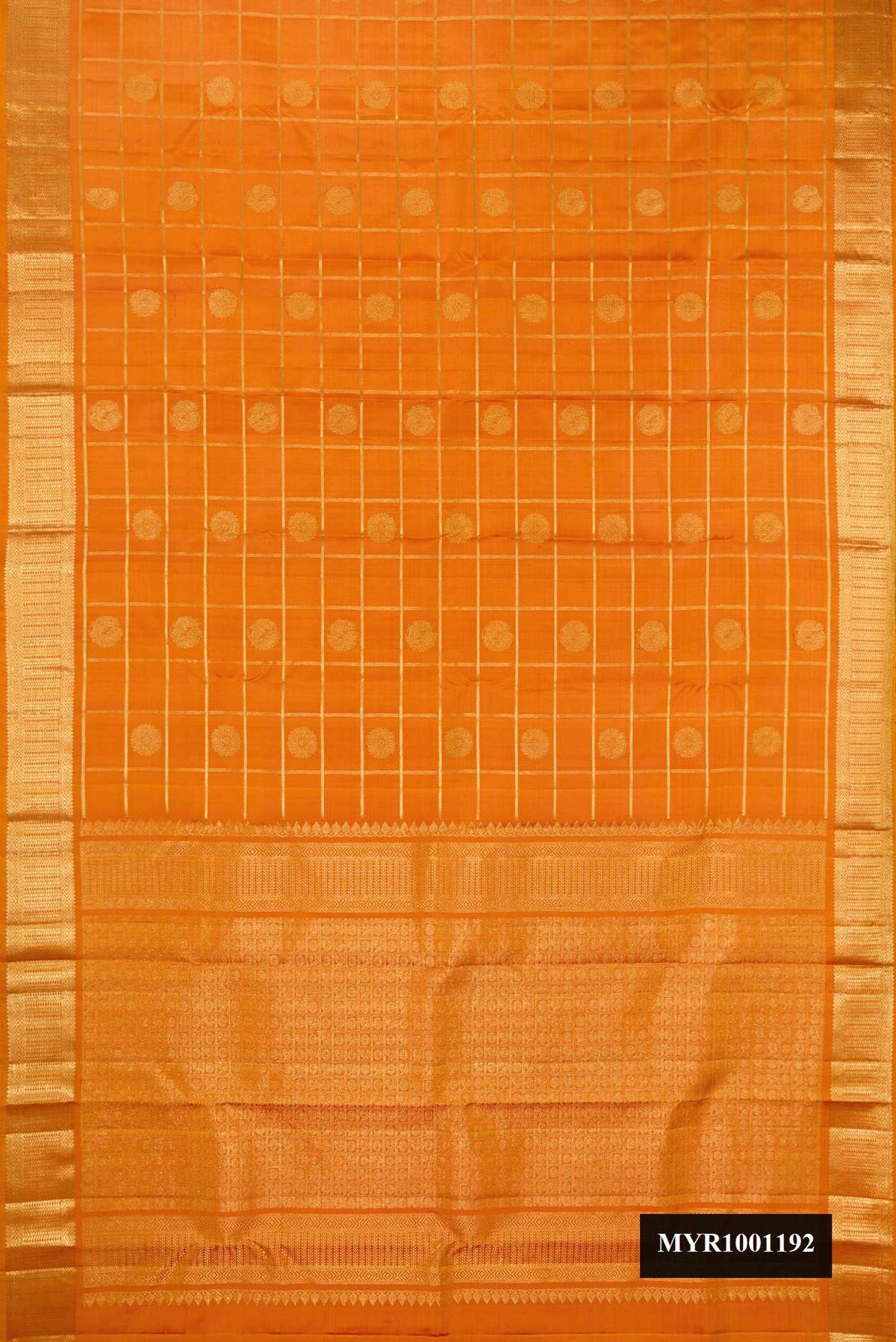 Mustard Dual Tone Kanchipuram Silk Saree with Checked design on the body and Zari Border.  displayed on a mannequin