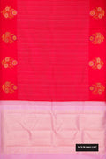 Red Dual Tone Kanchipuram Silk Saree with Stripes on the body and Fancy Border.  displayed on a mannequin
