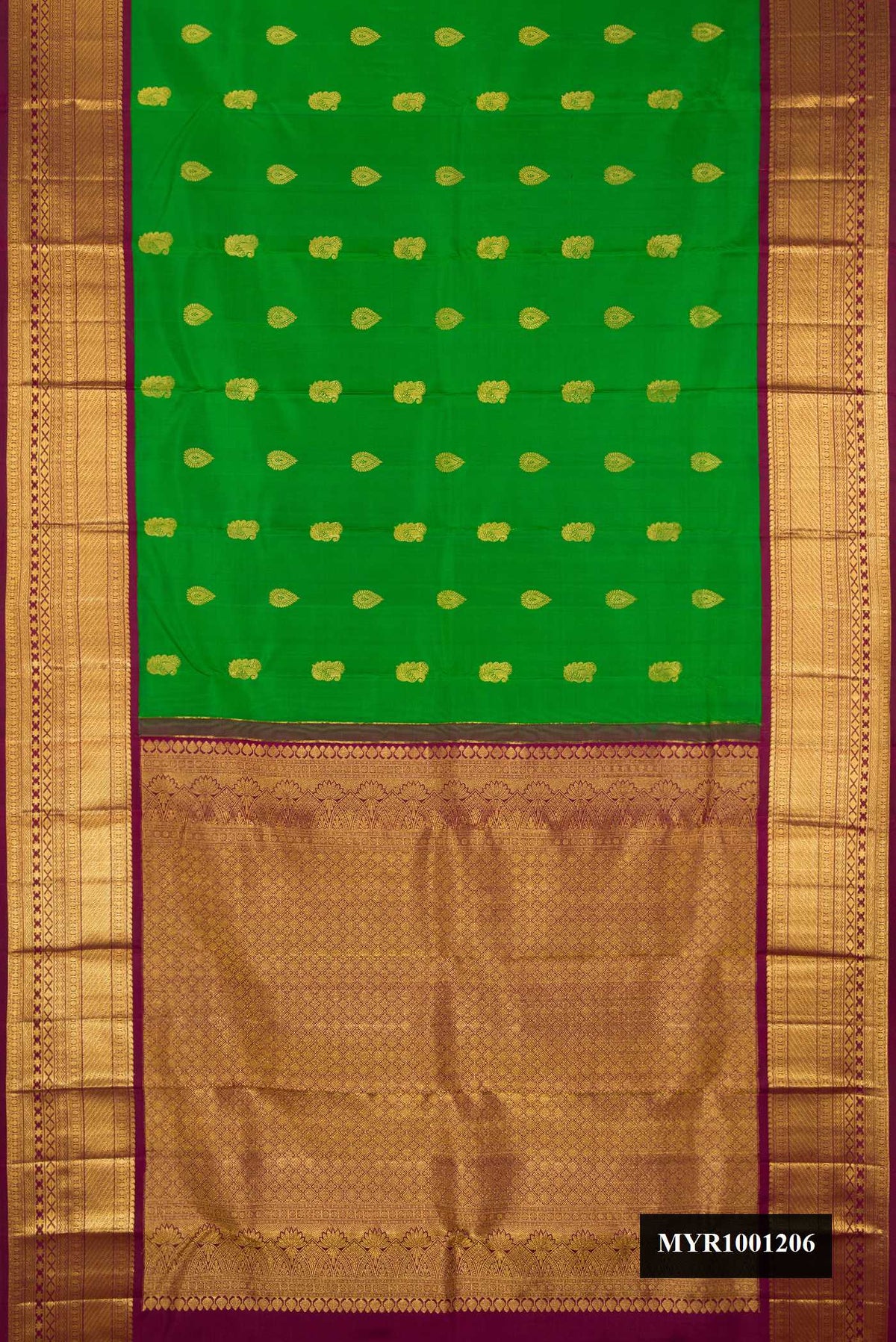 Green Dual Tone Kanchipuram Silk Saree with Zari Butta on the body and Zari Border.  displayed on a mannequin