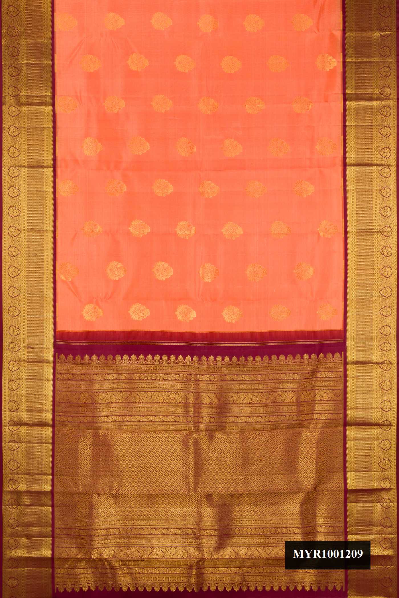 Orange Dual Tone Kanchipuram Silk Saree with Zari Butta on the body and Zari Border.  displayed on a mannequin