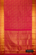 Maroon Dual Tone Kanchipuram Silk Saree with Zari Brocade on the body and Zari Border.  displayed on a mannequin