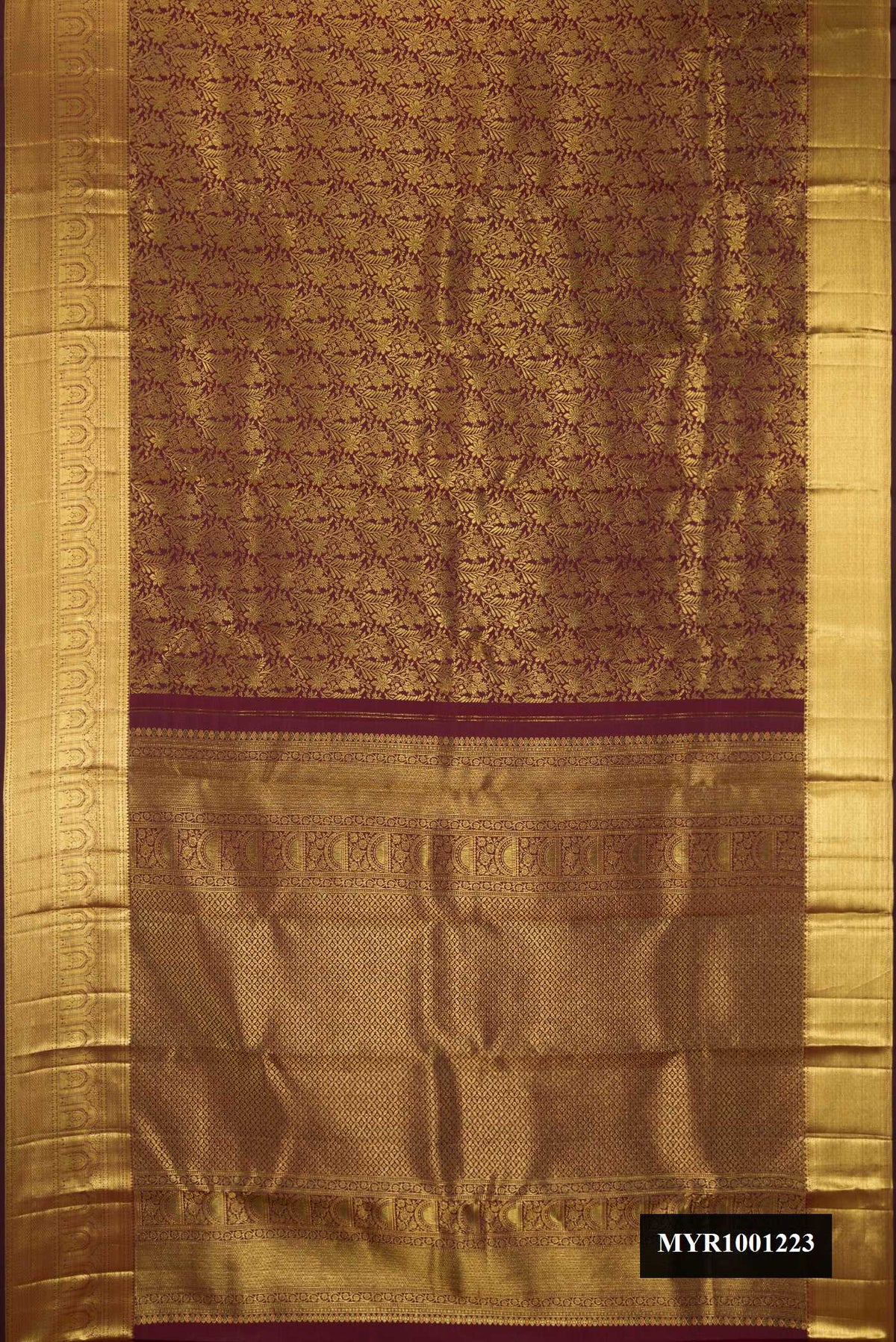 Maroon Dual Tone Kanchipuram Silk Saree with Zari Brocade on the body and Fancy Border.  displayed on a mannequin