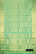 Pista Green Dual Tone Kanchipuram Silk Saree with Zari Brocade on the body and Zari Border.  displayed on a mannequin