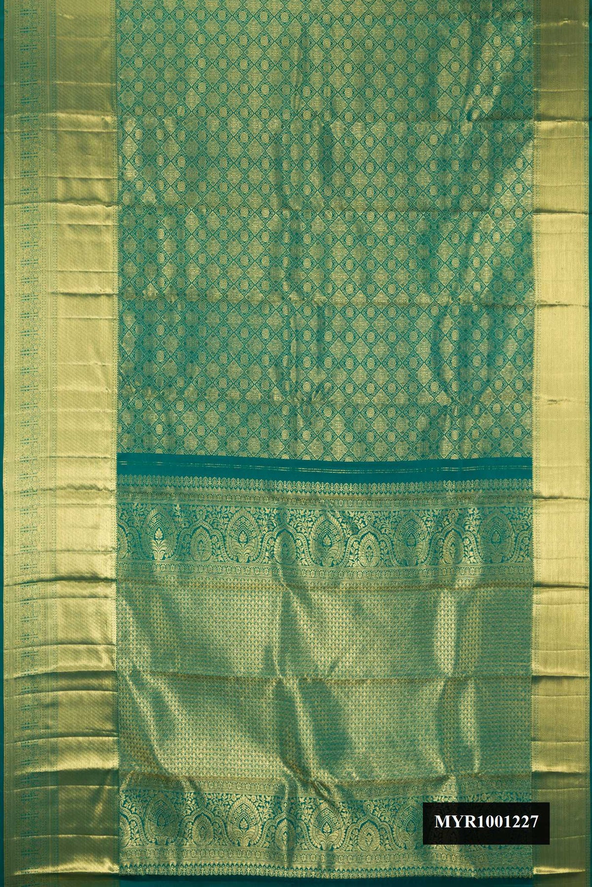 Green Dual Tone Kanchipuram Silk Saree with Zari Brocade on the body and Zari Border.  displayed on a mannequin