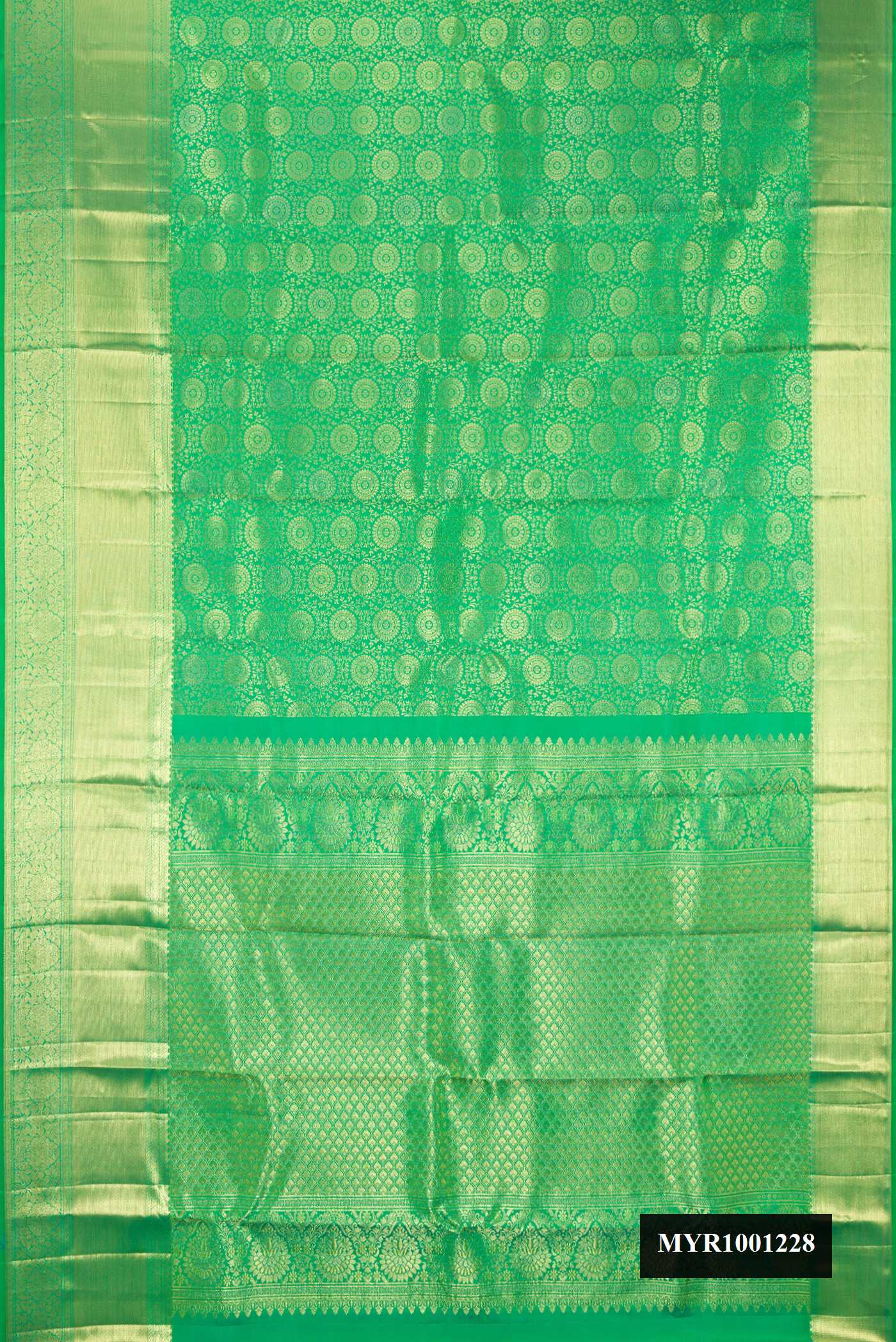 Green Dual Tone Kanchipuram Silk Saree with Zari Brocade on the body and Fancy Border.  displayed on a mannequin