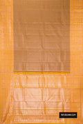 Brown Dual Tone Kanchipuram Tissue Silk Saree with Zari Brocade on the body and Fancy Border.  displayed on a mannequin