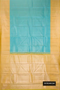 Blue Dual Tone Kanchipuram Tissue Silk Saree with Zari Brocade on the body and Fancy Border.  displayed on a mannequin