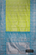 Green Dual Tone Kanchipuram Tissue Silk Saree with Zari Brocade on the body and Fancy Border.  displayed on a mannequin