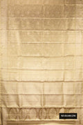 Mehandi Green Dual Tone Kanchipuram Tissue Silk Saree with Zari Brocade on the body and Fancy Border.  displayed on a mannequin