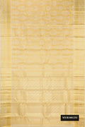 Gold Dual Tone Kanchipuram Tissue Silk Saree with Zari Brocade on the body and Zari Border.  displayed on a mannequin