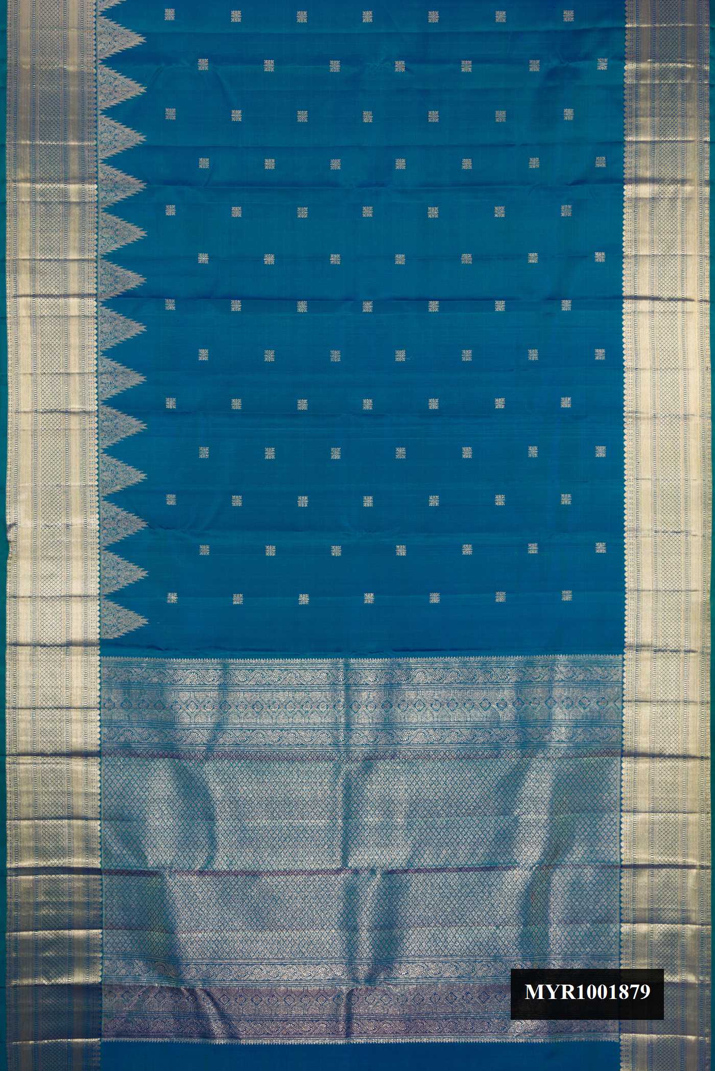 Peacock Blue Dual Tone Kanchipuram Silk Saree with Zari Butta on the body and Temple Border.  displayed on a mannequin
