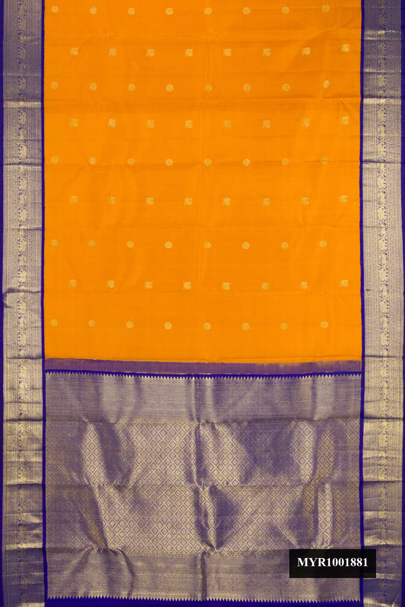 Mustard Dual Tone Kanchipuram Silk Saree with Zari Butta on the body and Zari Border.  displayed on a mannequin