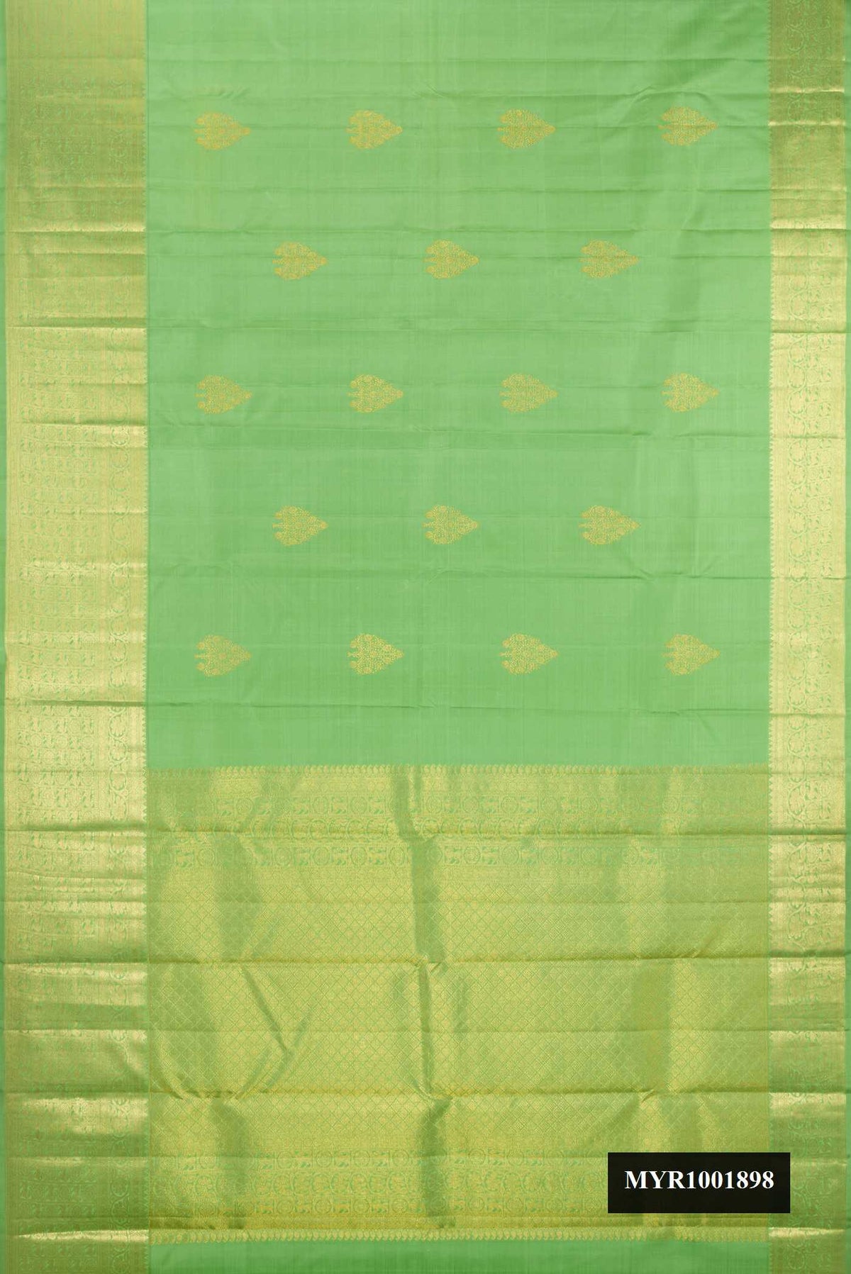 Pista Green Dual Tone Kanchipuram Silk Saree with Zari Butta on the body and Zari Border.  displayed on a mannequin