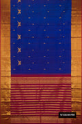 Royal Blue Dual Tone Kanchipuram Silk Saree with Zari Butta on the body and Zari Border.  displayed on a mannequin