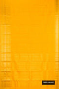 Mustard Dual Tone Kanchipuram Silk Saree with Zari Butta on the body and Zari Border.  displayed on a mannequin