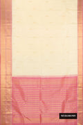 Sandal Dual Tone Kanchipuram Silk Saree with Zari Butta on the body and Zari Border.  displayed on a mannequin