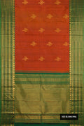 Rust Dual Tone Kanchipuram Silk Saree with Zari Butta on the body and Fancy Border.  displayed on a mannequin