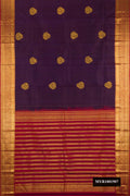 Violet Dual Tone Kanchipuram Silk Saree with Zari Butta on the body and Zari Border.  displayed on a mannequin