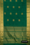 Bottle Green Dual Tone Kanchipuram Silk Saree with Zari Butta on the body and Zari Border.  displayed on a mannequin