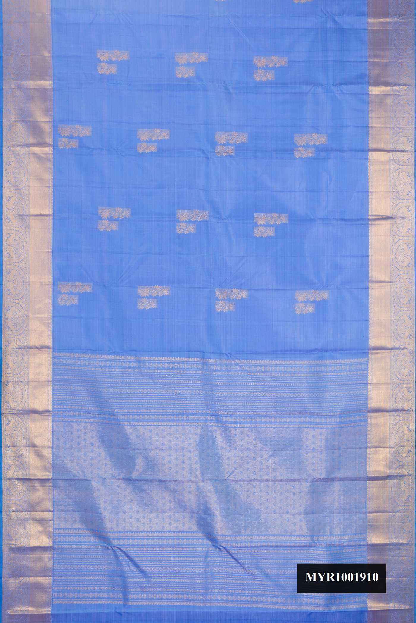 Lilac Dual Tone Kanchipuram Silk Saree with Zari Butta on the body and Zari Border.  displayed on a mannequin