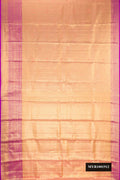 Peach Dual Tone Kanchipuram Tissue Silk Saree with Zari Brocade on the body and Zari Border.  displayed on a mannequin
