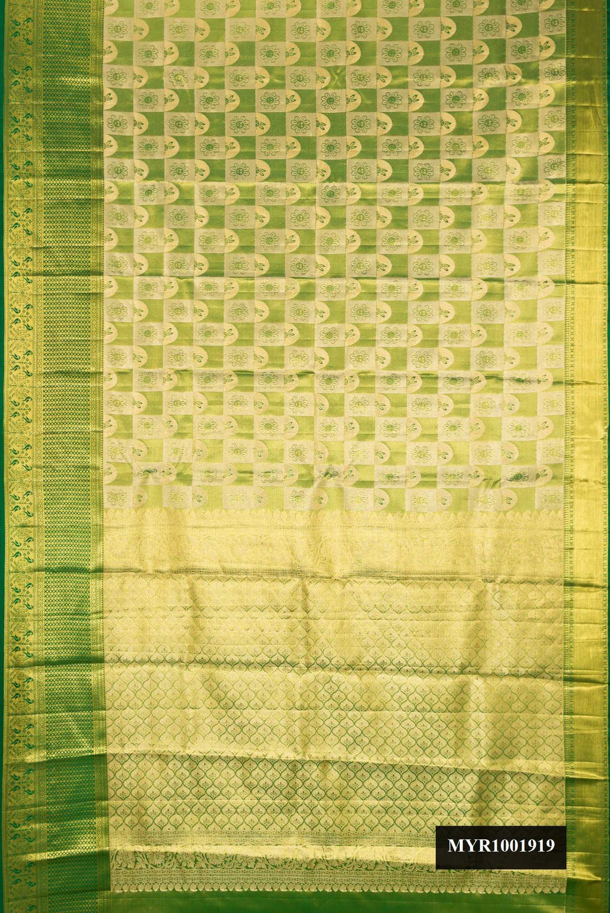 Green Dual Tone Kanchipuram Tissue Silk Saree with Zari Brocade on the body and Zari Border.  displayed on a mannequin