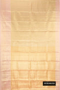 Gold Dual Tone Kanchipuram Tissue Silk Saree with Zari Brocade on the body and Zari Border.  displayed on a mannequin
