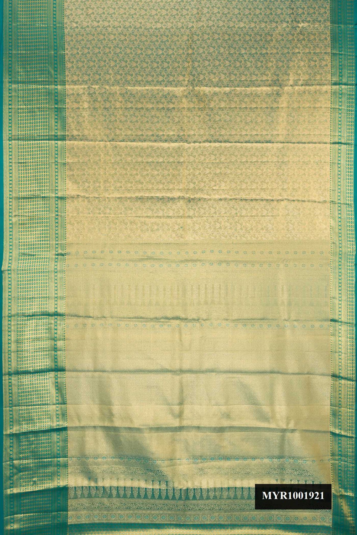 Green Dual Tone Kanchipuram Tissue Silk Saree with Zari Brocade on the body and Zari Border.  displayed on a mannequin