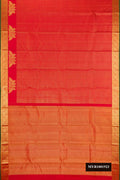 Red Dual Tone Kanchipuram Silk Saree with Checked design on the body and Fancy Border.  displayed on a mannequin