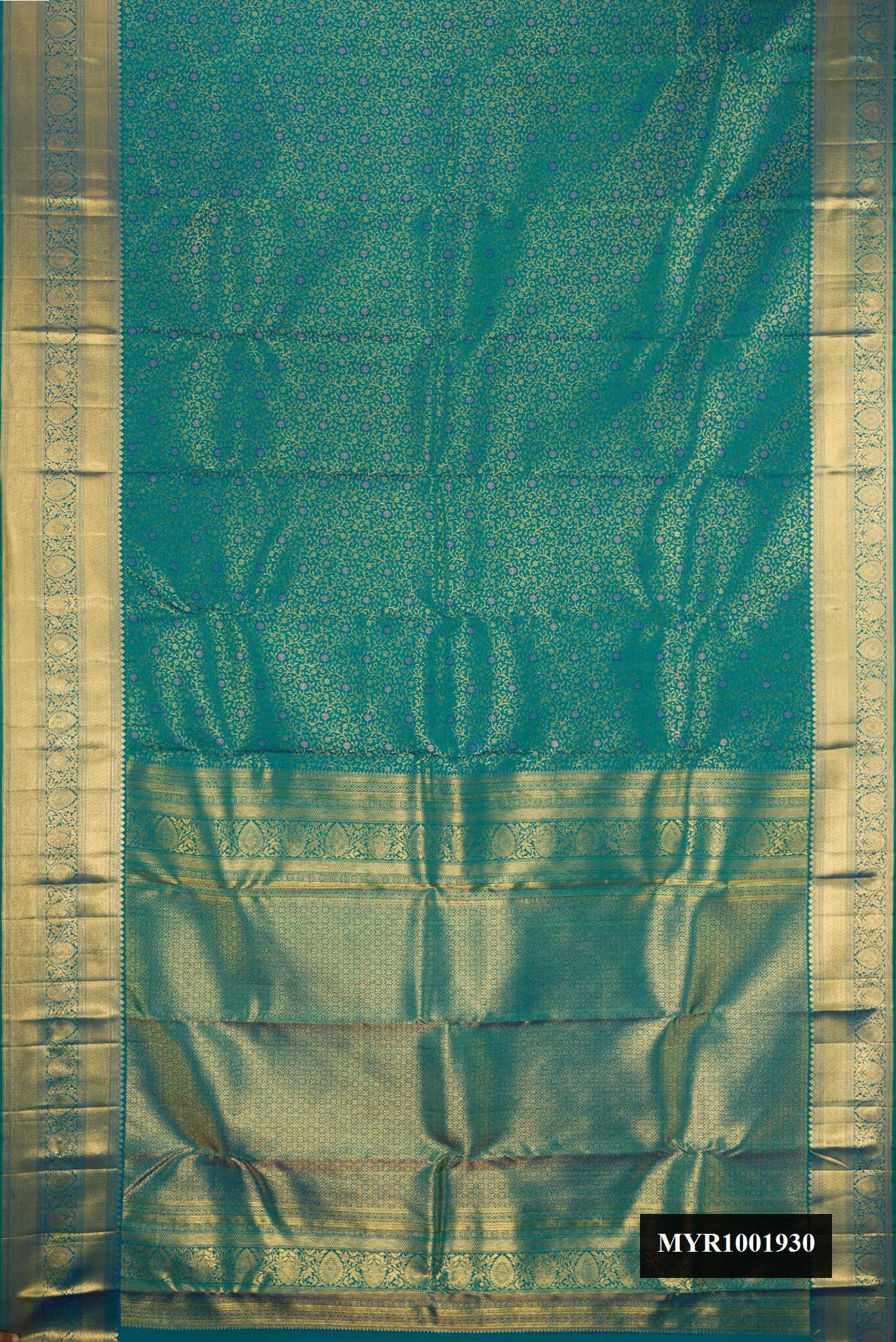 Peacock Blue Dual Tone Kanchipuram Silk Saree with Zari Brocade on the body and Zari Border.  displayed on a mannequin