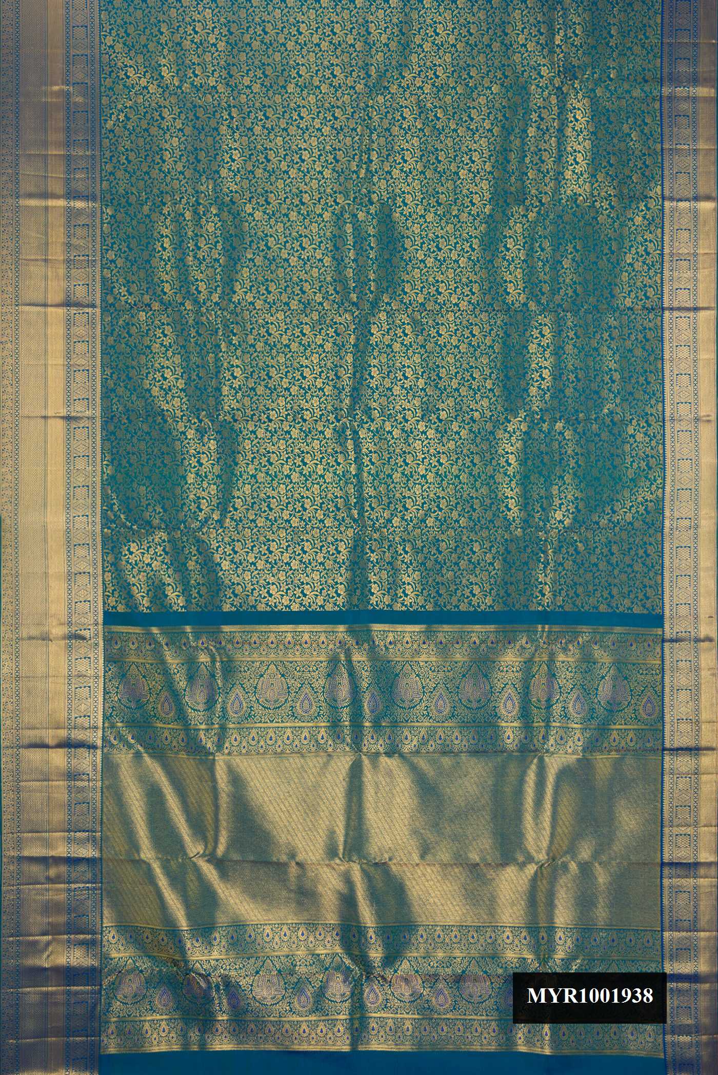 Peacock Blue Dual Tone Kanchipuram Silk Saree with Zari Brocade on the body and Zari Border.  displayed on a mannequin