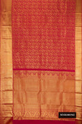 Maroon Dual Tone Kanchipuram Silk Saree with Zari Brocade on the body and Zari Border.  displayed on a mannequin