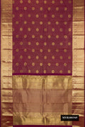 Maroon Dual Tone Kanchipuram Silk Saree with Stripes on the body and Zari Border.  displayed on a mannequin