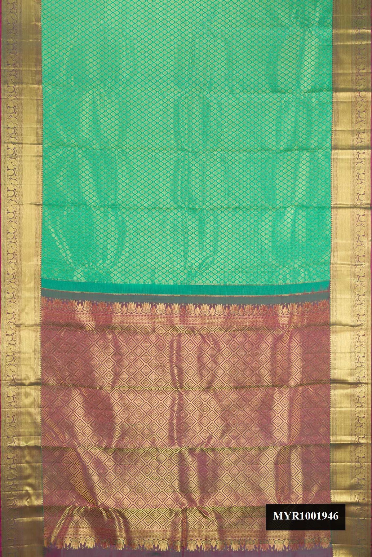 Green Dual Tone Kanchipuram Silk Saree with Zari Brocade on the body and Zari Border.  displayed on a mannequin