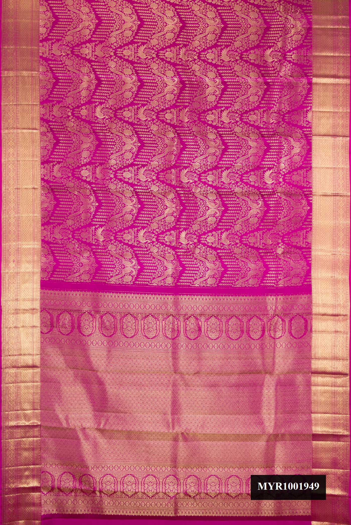 Magenta Dual Tone Kanchipuram Silk Saree with Zari Brocade on the body and Zari Border.  displayed on a mannequin