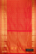 Red Dual Tone Kanchipuram Silk Saree with Zari Brocade on the body and Zari Border.  displayed on a mannequin