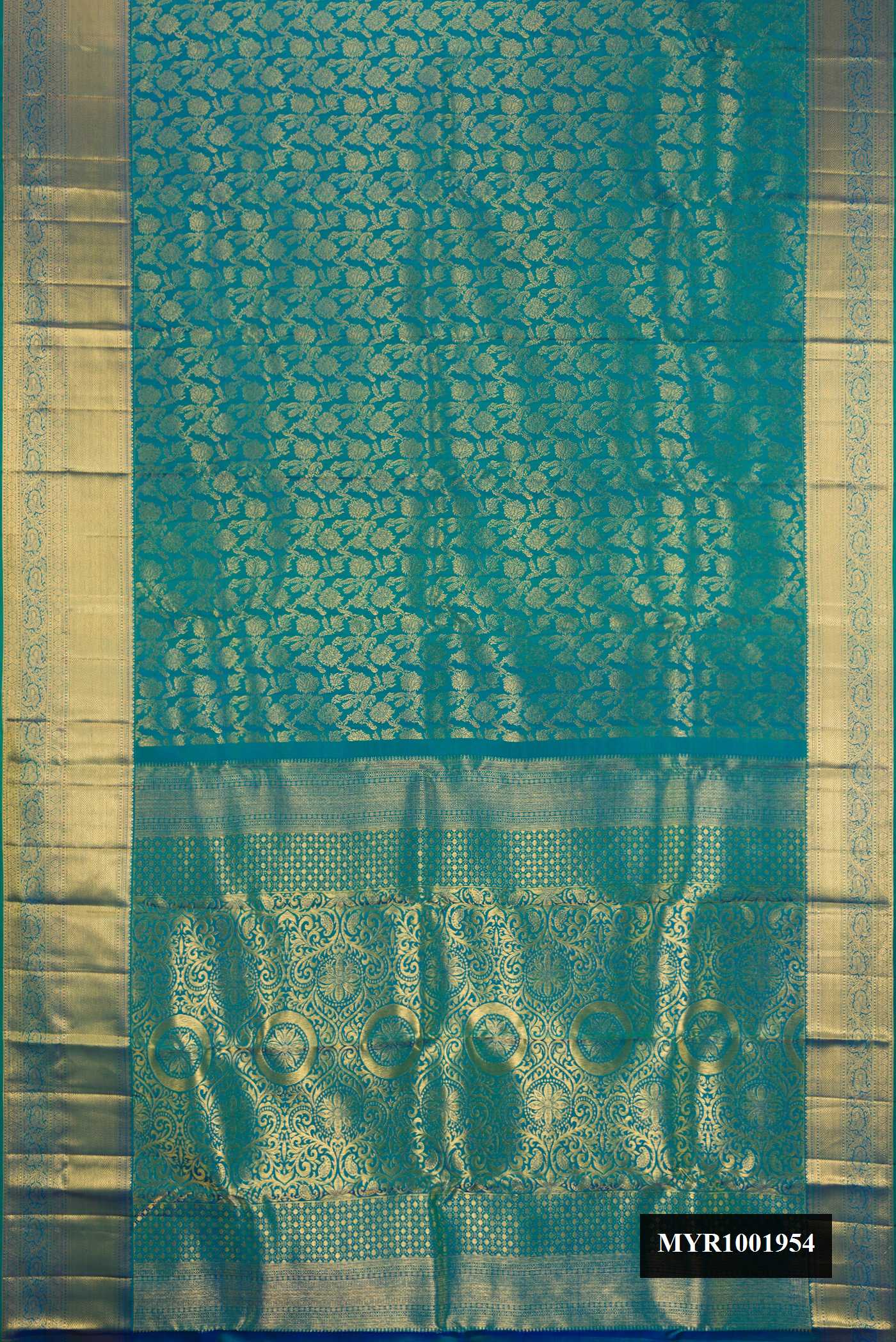Peacock Blue Dual Tone Kanchipuram Silk Saree with Zari Brocade on the body and Zari Border.  displayed on a mannequin